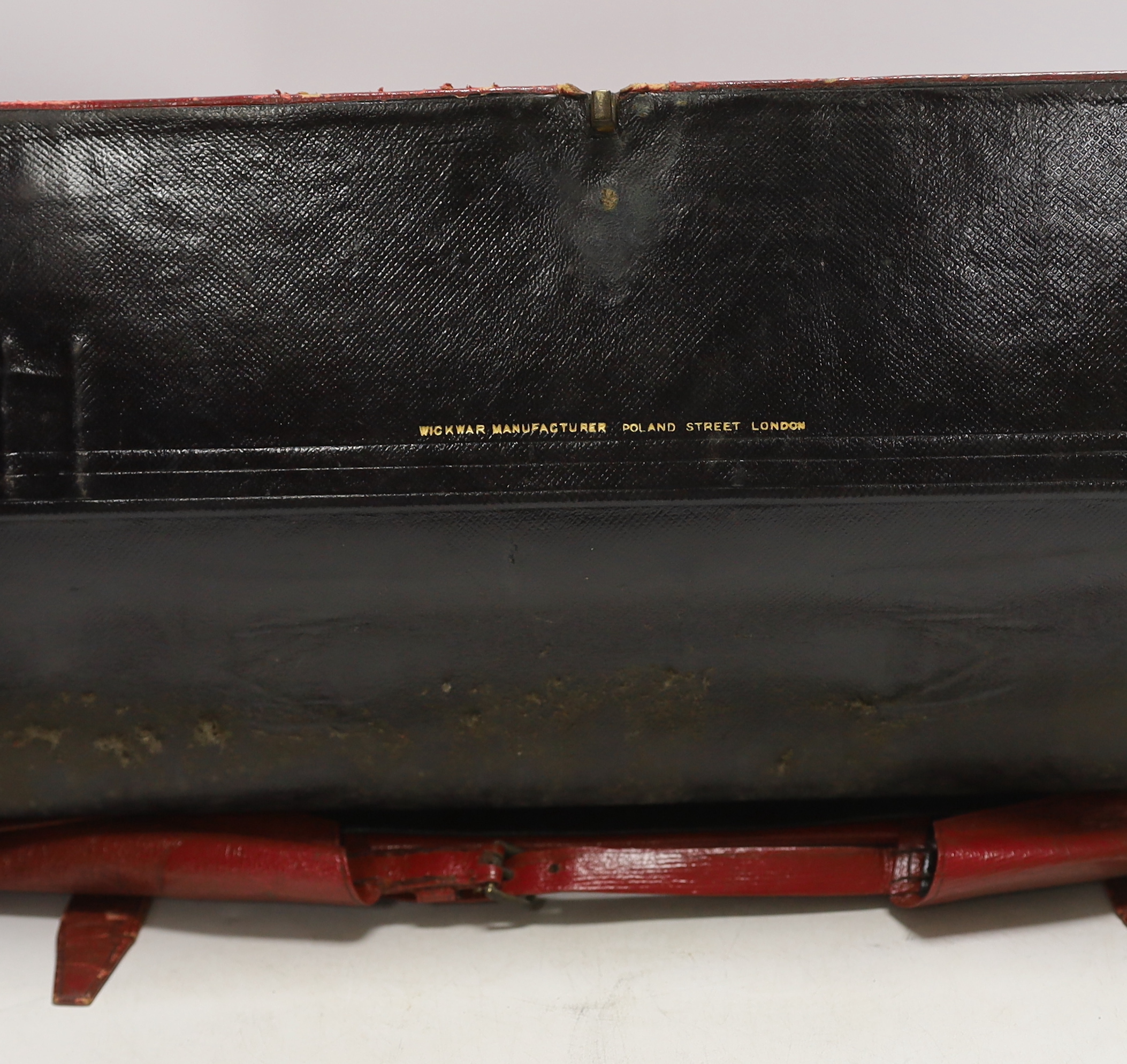 A vintage Moroccan red leather briefcase used by Willie Kendall in ‘Diplomacy’, Wickwar Manufacturer, Poland street, London, with handwritten letters